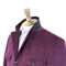 Purple jacket on a mannequin with a white background