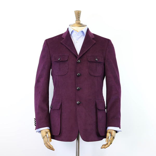 Purple blazer on a mannequin against a white background