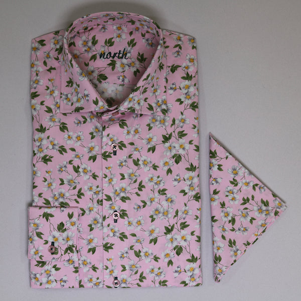 White daisy on pink background cotton shirt with pink buttons and green stitching. And handkerchief from same material