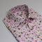 White daisy on pink background cotton shirt with pink buttons and green stitching. And handkerchief from same material