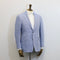 Light blue blazer on a mannequin against a white background