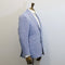 Light blue suit jacket on a mannequin against a white background
