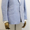 Blue textured blazer on a mannequin with a plain background